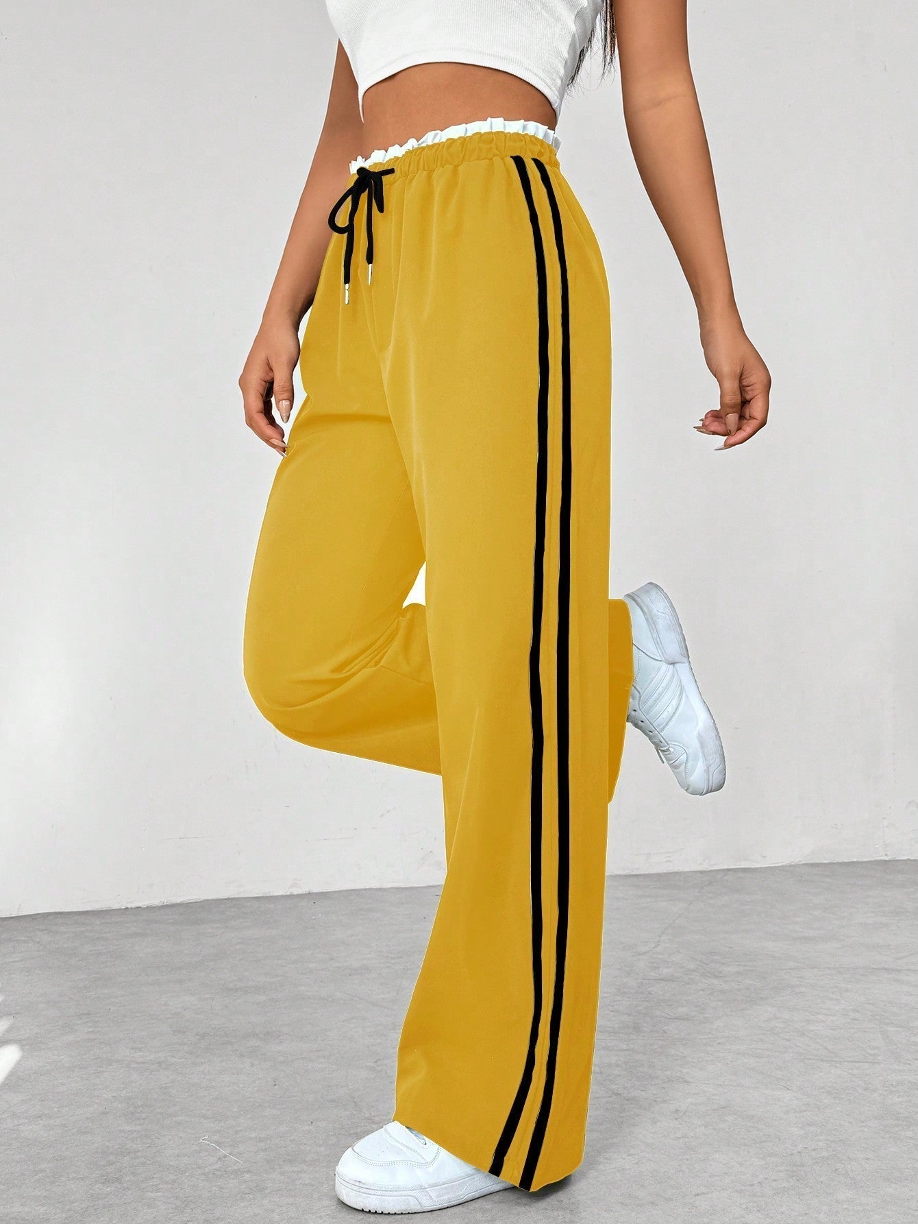 Selene – Sportieve wide-leg broek met trendy strependetail voor dames