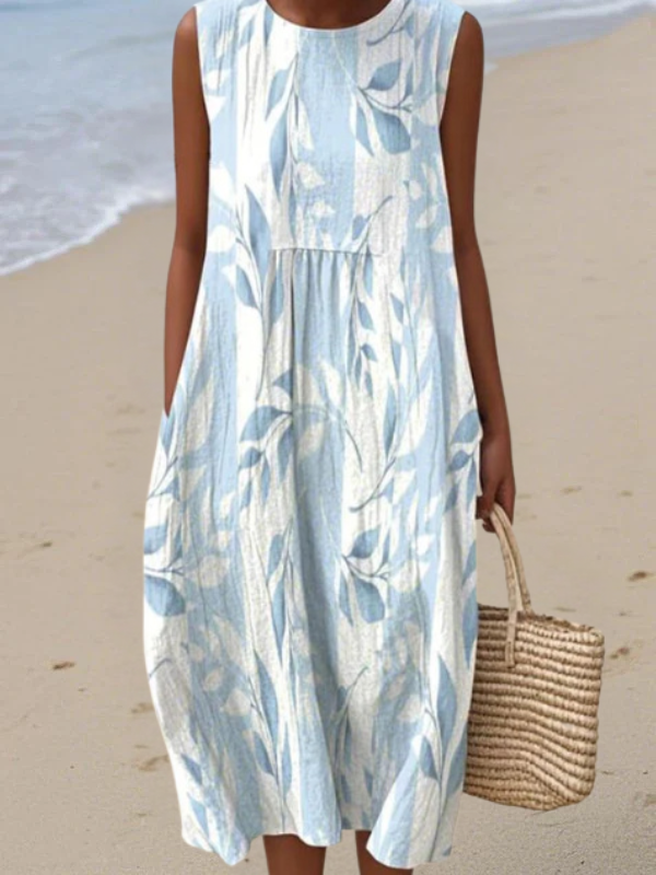 Dames midi jurk met bladprint en losse pasvorm
