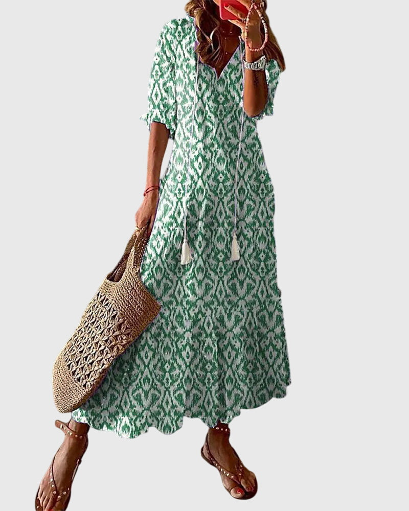 Dames boho maxi jurk met V-hals en vintage print
