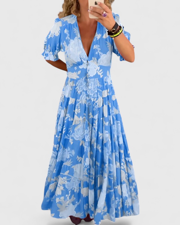 Dames zomerjurk met bloemenprint en zakken