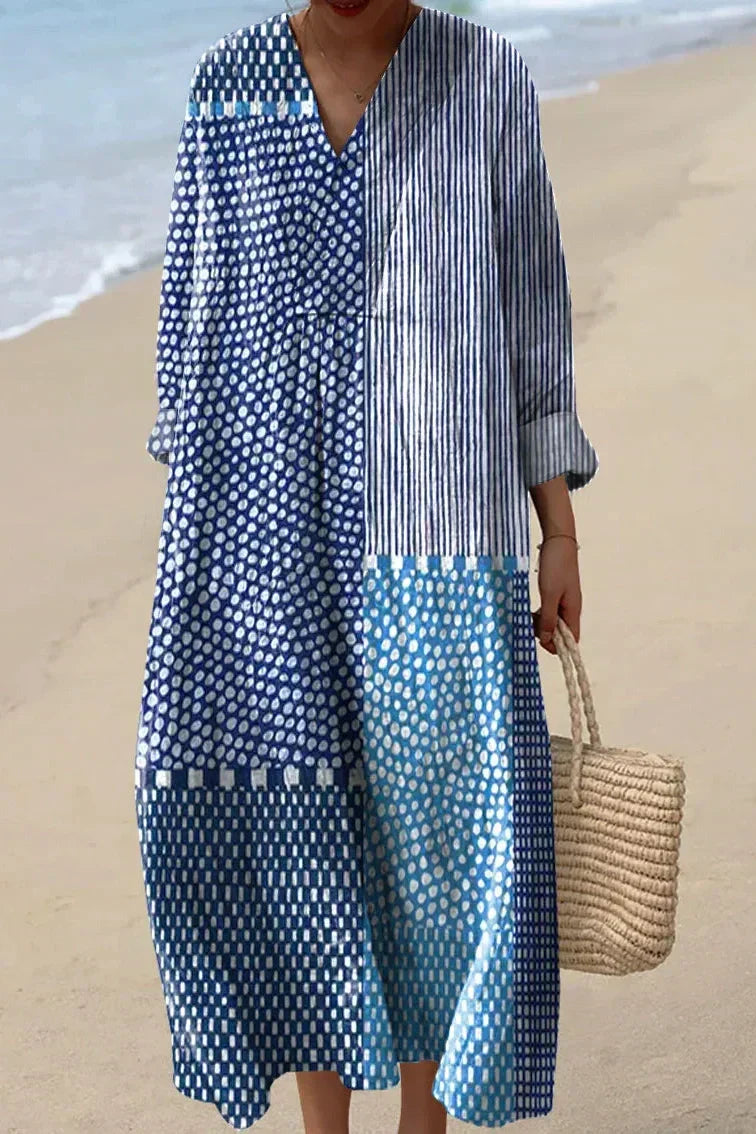 Dames maxi jurk met V-hals en print in blauwtinten