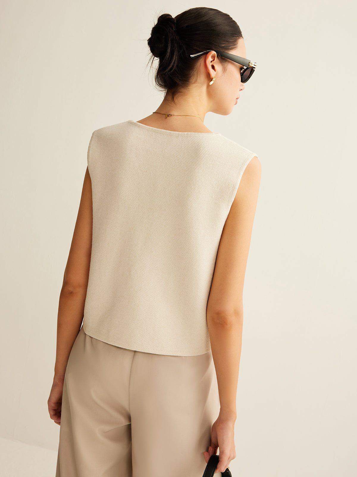 Asymmetrisch gebreid damesvest met knoopsluiting – regular fit en stretch