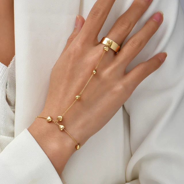 Aurelia Hand Chain – Verfijnde Elegantielijn in Goud