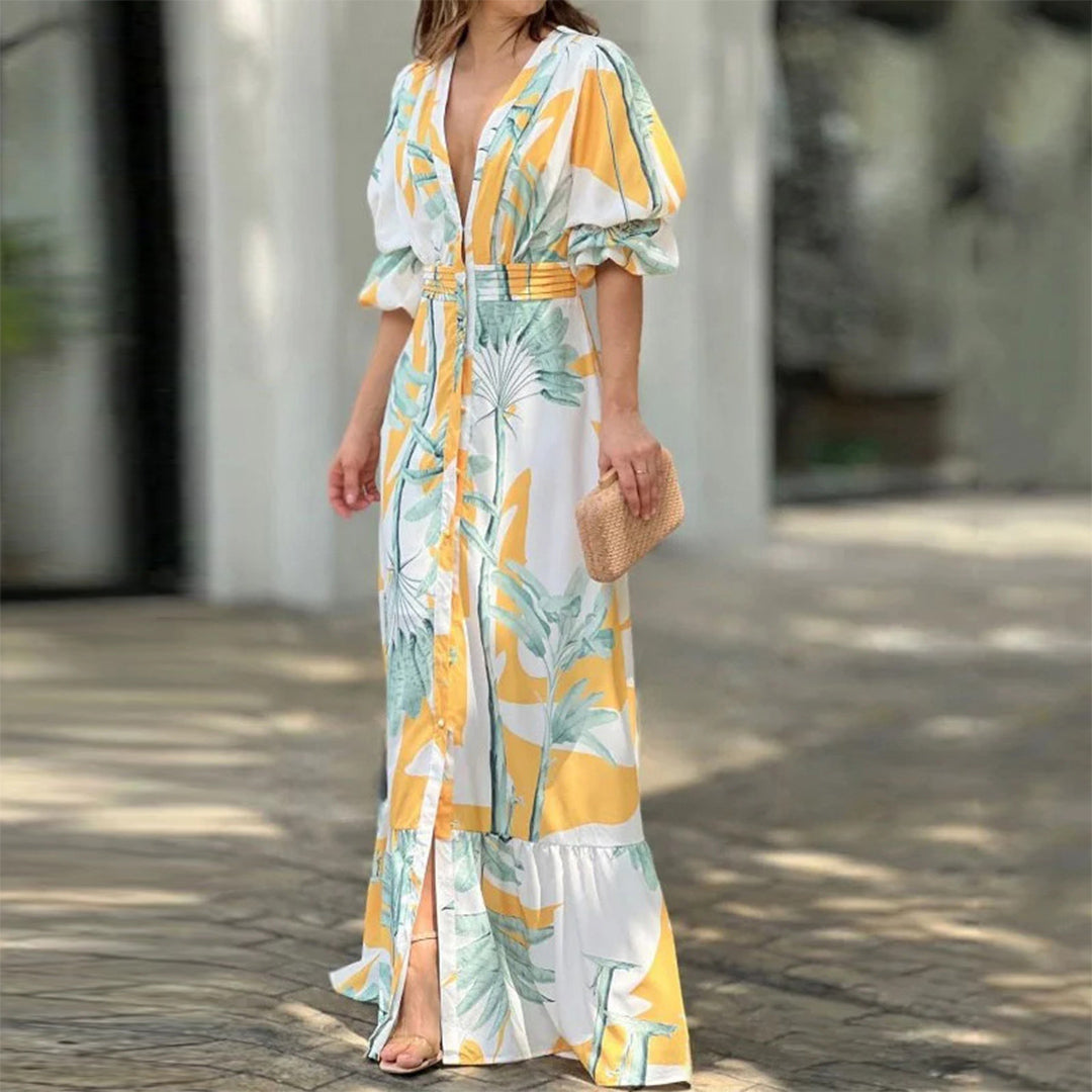 Solarya – Maxi zomerjurk met geknoopte taille en speelse elegantie