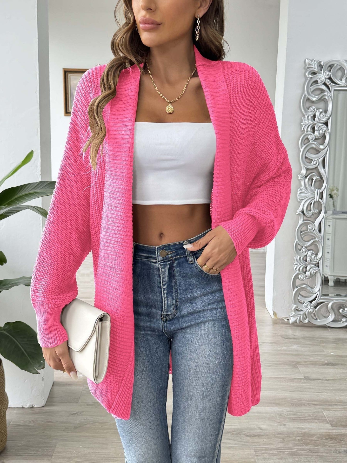Marielle – Lang damesvest met sjaalkraag en subtiel pareldetail