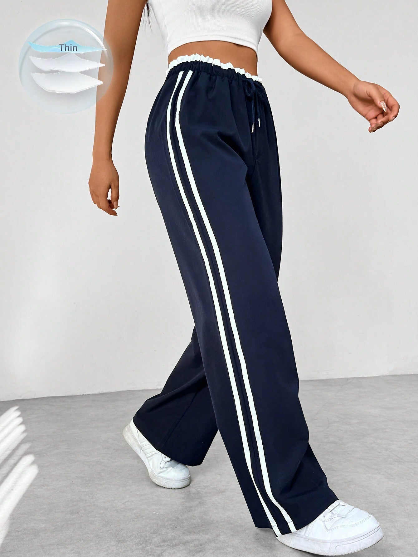 Selene – Sportieve wide-leg broek met trendy strependetail voor dames