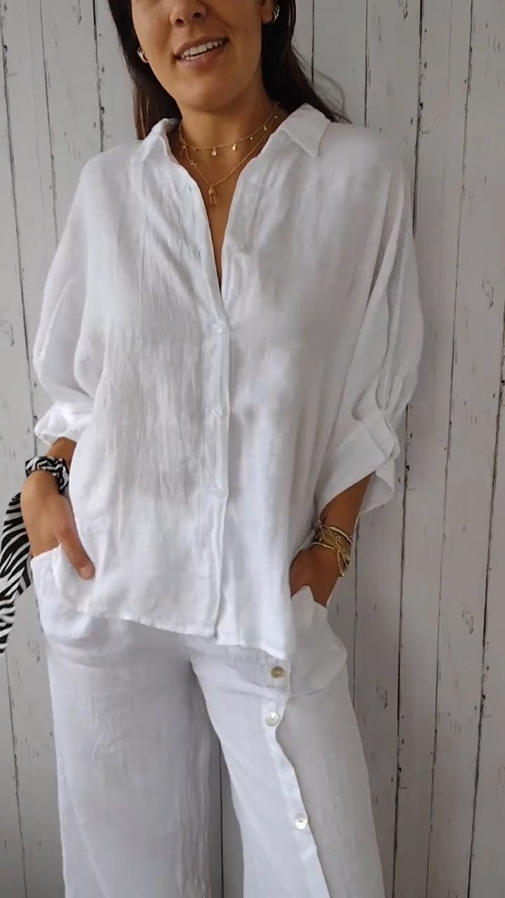 Elarine – Verfijnde damesblouse met open rug en strikdetail