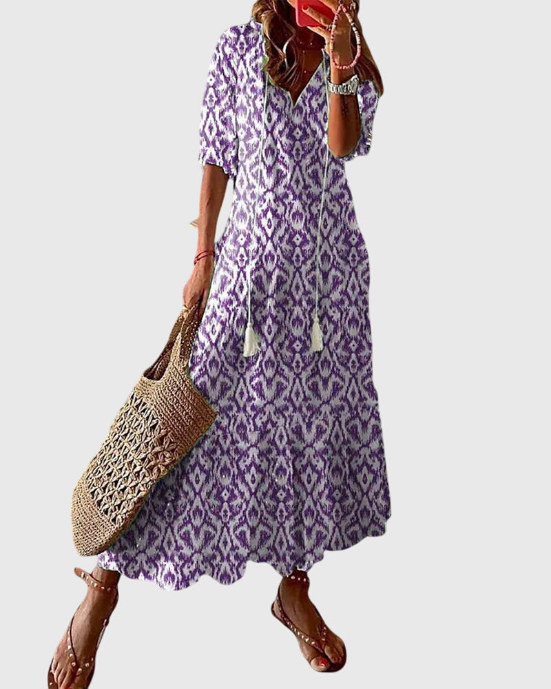 Dames boho maxi jurk met V-hals en vintage print