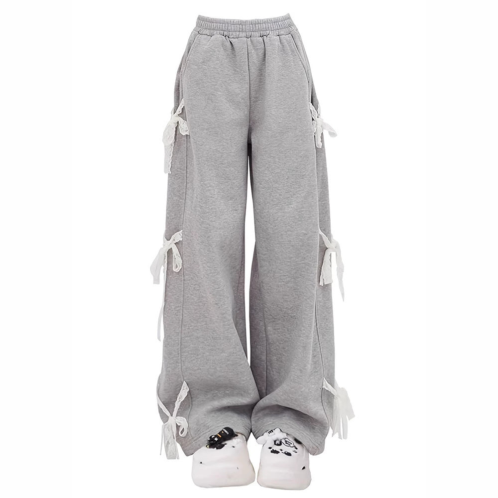 Sylvara Broek – Elegante Wijde Broek met Delicate Kanten Strik