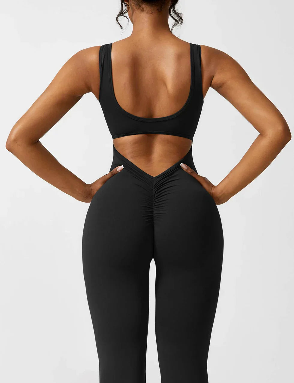 Elenaya – Flared shaping jumpsuit met diepe V-rug